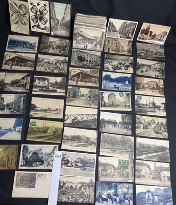 a lot of old postcards sitting on a table