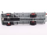 a toy train that is sitting on a white surface