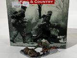 boxed box of action figures of soldiers in action on a white surface