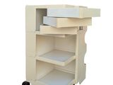 an image of a white cart with drawers on wheels