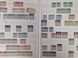 a book with a bunch of different stamps on it