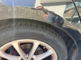a close up of a tire on a car