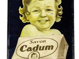 an old sign with a child holding a carton of caulim on it
