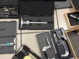 a lot of tools that are sitting on the floor