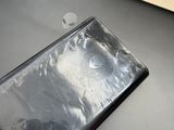 a laptop with a broken screen sitting on a desk
