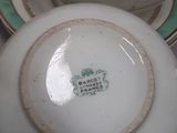 two bowls and a saucer sitting on a table