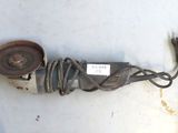 an old electric drill with a cord attached to it