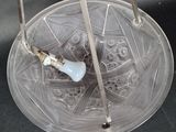 a glass bowl with a light bulb inside of it
