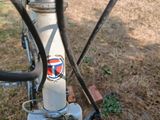 a close up view of a bicycle with a sticker on it