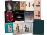 a lot of books that are sitting on a table