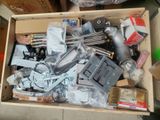 a box full of assorted items sitting on the floor