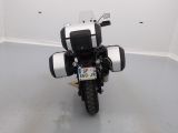 a black and white motorcycle parked in a room