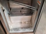 an image of an open refrigerator in a kitchen