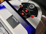 a remote control sitting on top of a game console