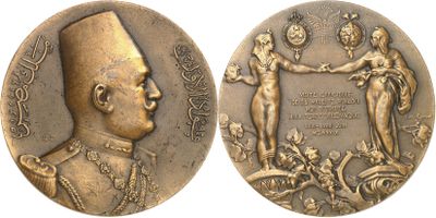 a close up of a medal with a man and woman on it