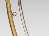 an image of a pair of swords that are on display