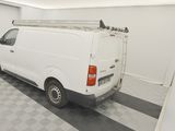 a white van that is parked in a garage