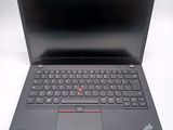 a close up of a laptop with a keyboard on a table