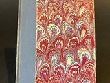 an image of a book with a red and blue cover