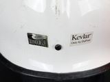 a close up of a motorcycle helmet with a sticker on it