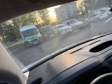 a view from inside a car of a city street