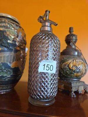 three vases sitting on a table with a price tag on them