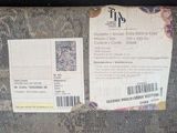 an image of a luggage bag with a ticket attached to it