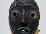an image of a black mask on a white background