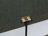 a piece of metal that is attached to a wall