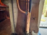 a pipe that is connected to a wall in a room