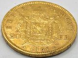 an image of a gold coin with a coat of arms on it