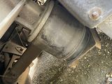 a close up of a car ' s exhaust pipe and exhaust pipe