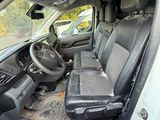 a car that has a seat in the back of it