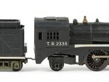 a toy train that is sitting on a white surface