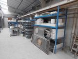 a room with a lot of shelves and a lot of shelves