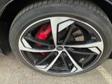 a close up of a tire on a car ' s rim
