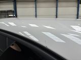 a close up of a car roof with stickers on it