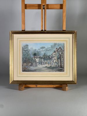 tableau posé sur un chevalet représentant un village avec une église en arrière-plan