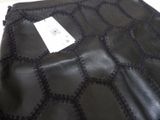 black lace fabric with black stitching on top of it