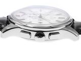 a close up of a watch on a white background