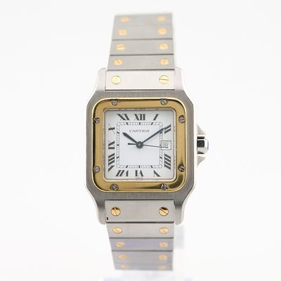 une image représentant une montre-bracelet en argent et en or avec des chiffres romains