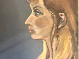 painting of a woman with long blonde hair and earrings in profile