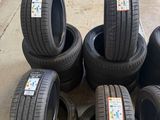 several tires stacked on top of each other in a garage