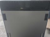 an image of a dishwasher sitting on top of a table