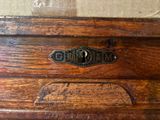 a close up of a wooden chest with a lock on it
