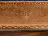 a close up view of the inside of a brown and black bag