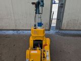 an image of a machine that is sitting in a garage
