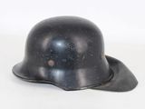 a helmet that is sitting on a white surface