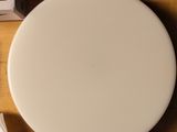 a picture of a toilet seat with the lid down