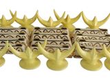 four yellow vases with horns are lined up against a white background